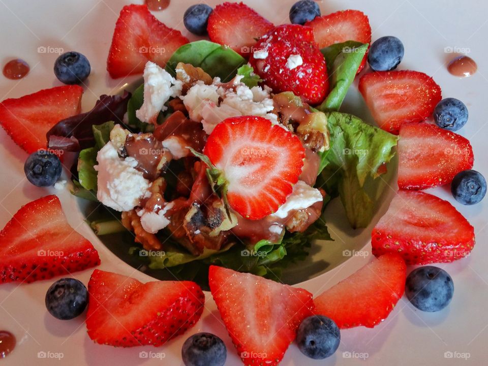 Fruit Salad With Strawberries And Blueberries And Goat Cheese