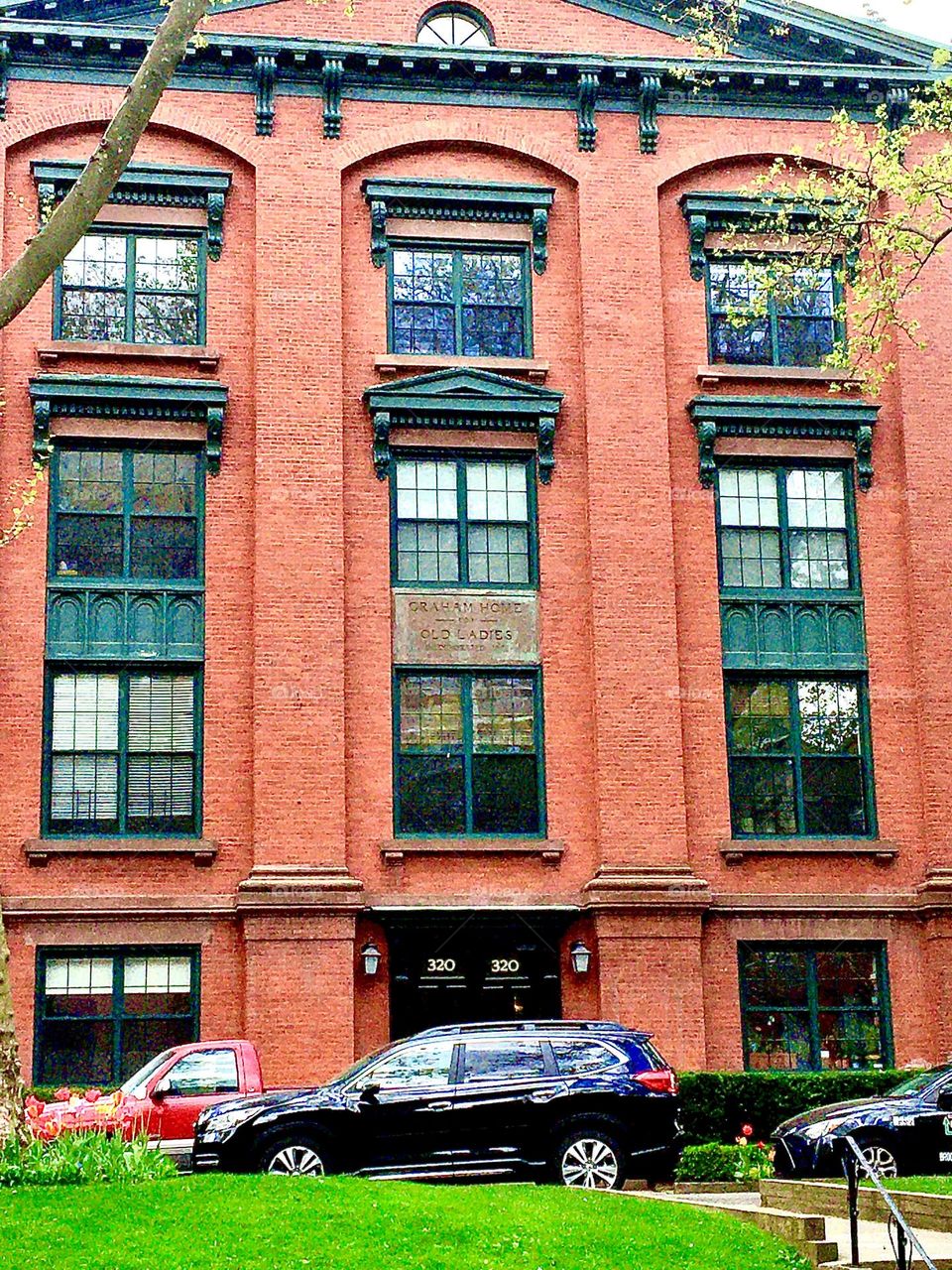 The “Graham Home for Old Ladies” in Ft Greene, Bklyn is a large brownstone building with old fashioned architectural elements such as offset levels, metal ornamentation and a plaque with the aforementioned inscription. 2020. Hypnotic Productions
