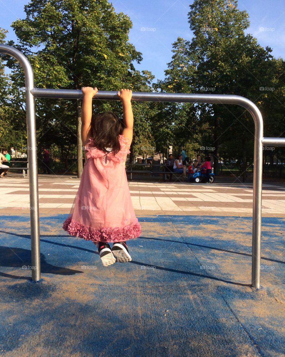 Child playing at outdoors playground