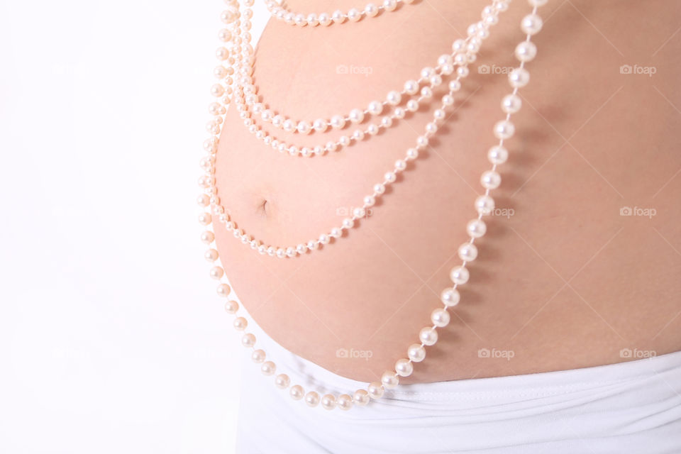 Tender white pregnancy with pearls 