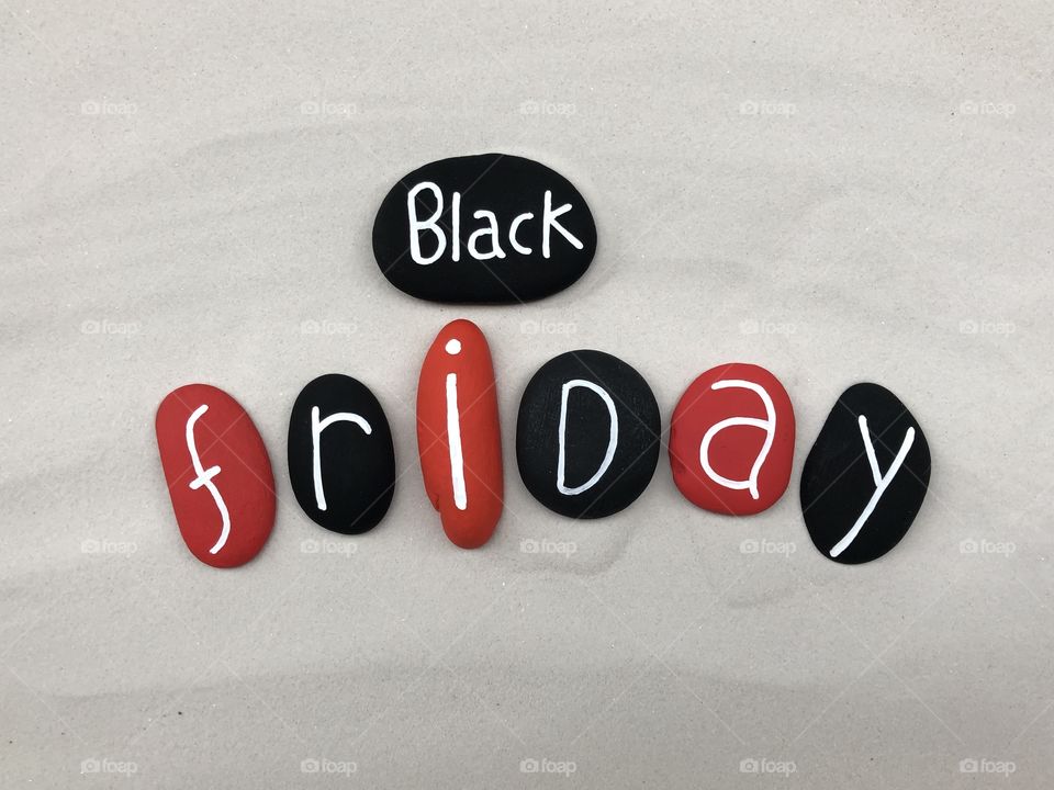 Black Friday with stones text