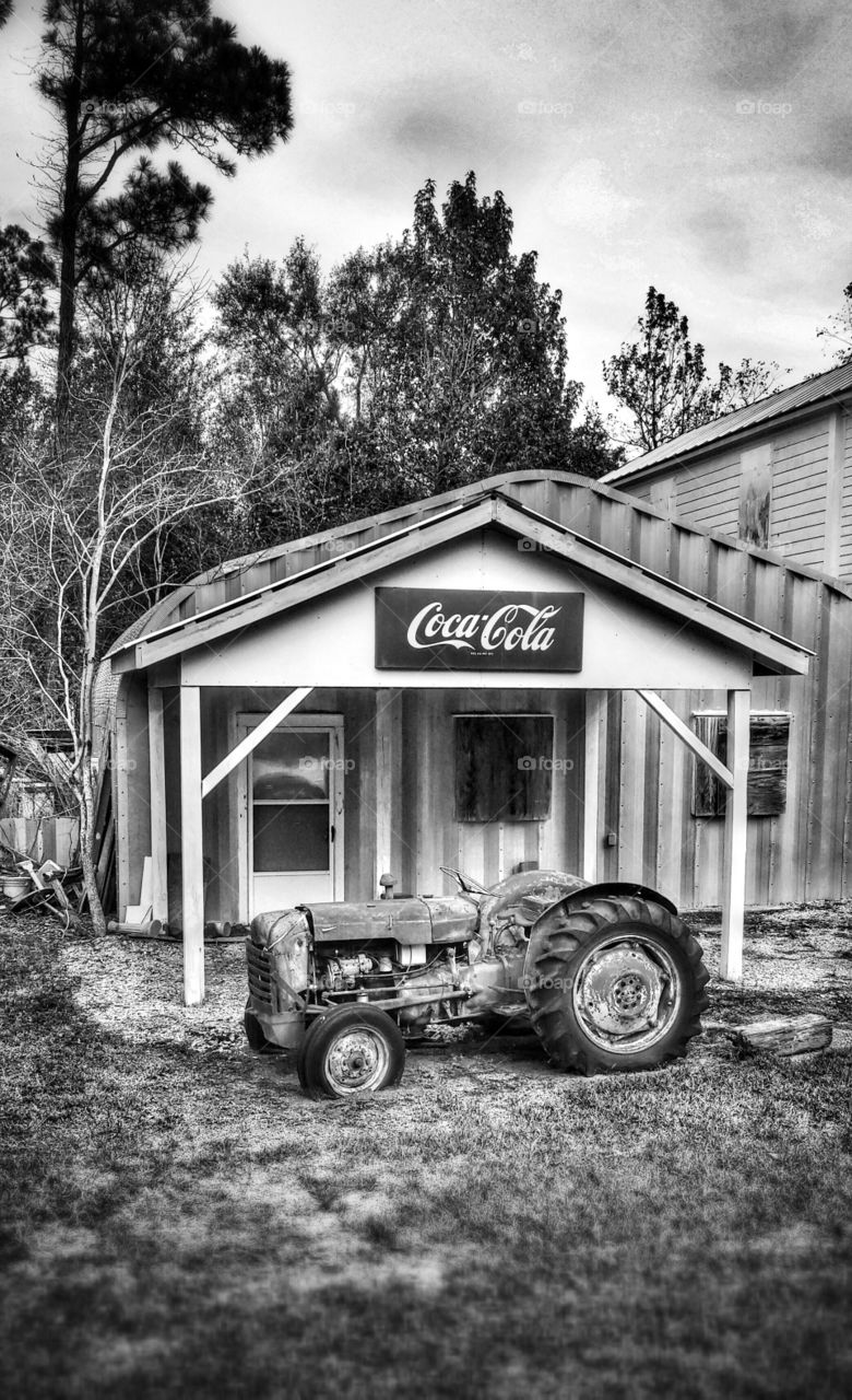 retired old tractor and store