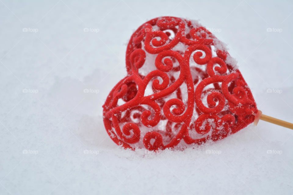 red hearts in the snow, winter time love