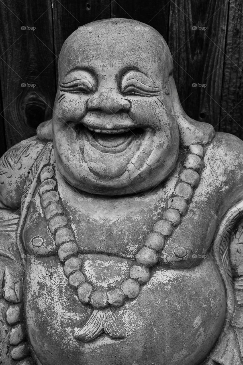 Close-up of laughing buddha