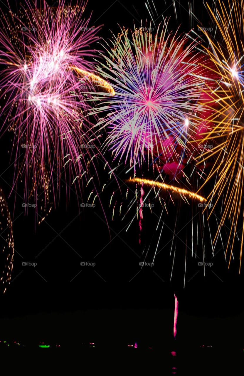 Here, over the Gulf of Mexico, a barrage of missiles designed to explode in a controlled way explode with brilliant red, orange, yellow, green, blue and purple colors! Thousands of people across the United States will be celebrating Independence Day on July 4th by attending firework displays!