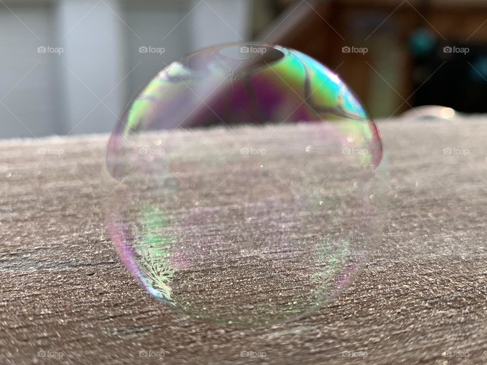 A winter wonderland. Ice crystals on top of a waste bin, on a chilly December morning. A well placed soap bubble on top, for a beautiful effect.