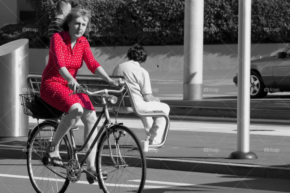 Lady In Red Riding A Bicycle