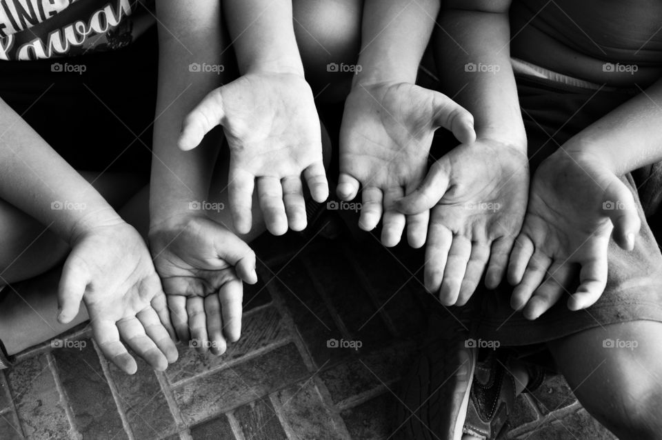 hands dirty of children playing