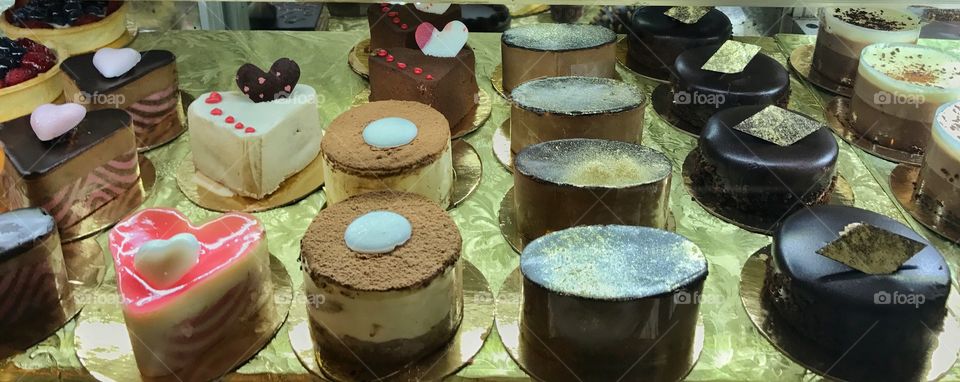 Chocolate truffles and cakes in a display