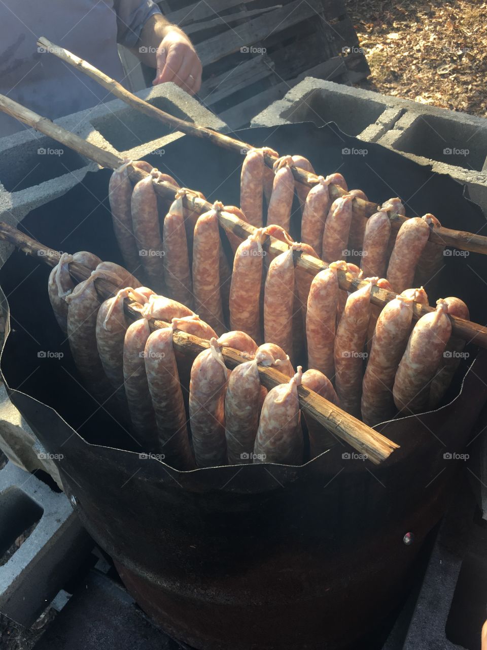 Sausages in homemade smoker