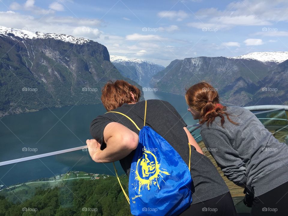 Appreciating the amazing fjord on the top of mountain 