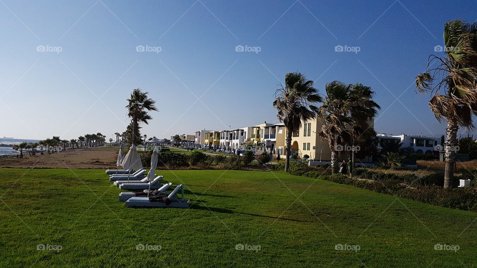 sunloungers at beach cyprus