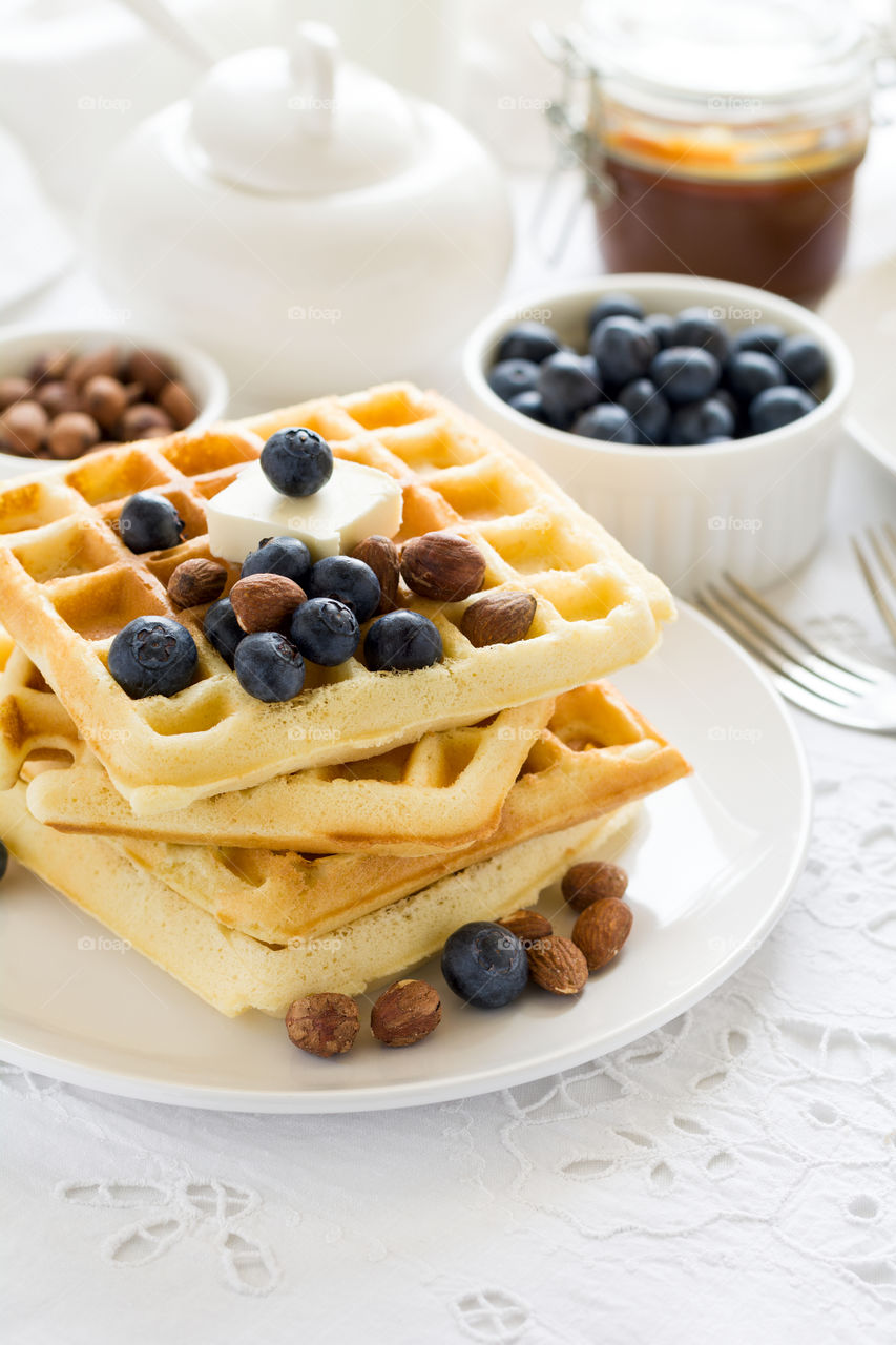 Belgian waffles with blueberries and nuts