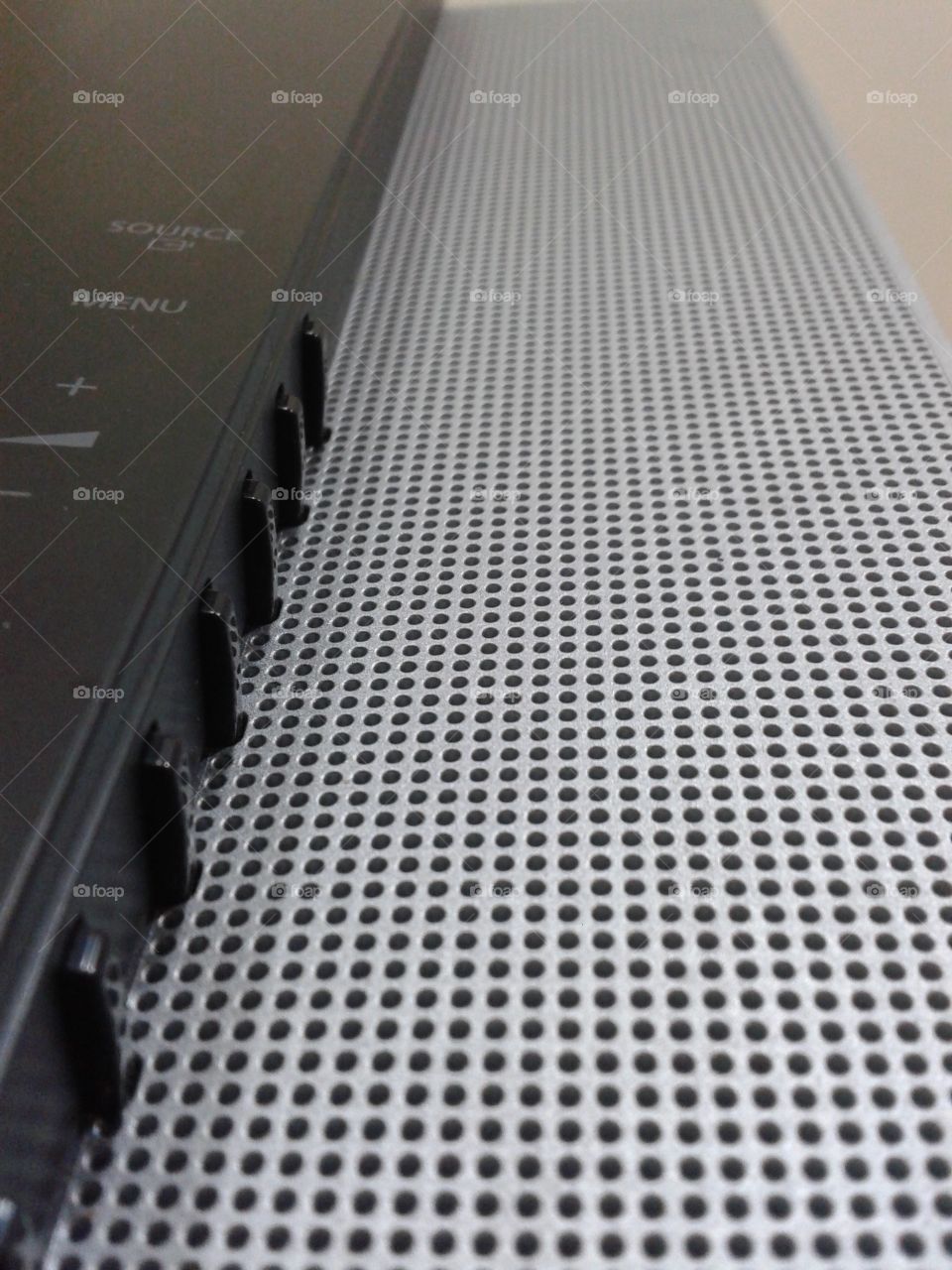 this is a macro of my television speaker that can be used as a wallpaper. I think it can be more beautiful if some chromatic effects apply