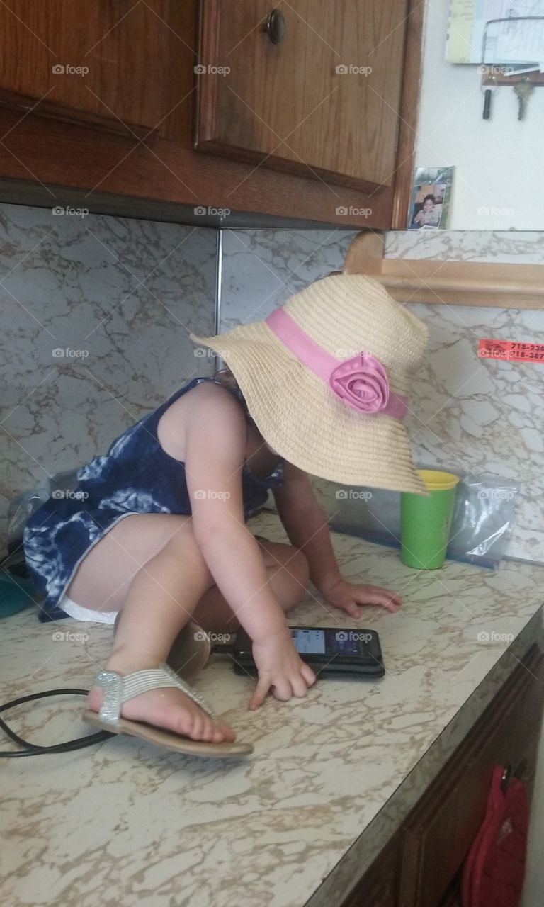 toddler watching on smartphone