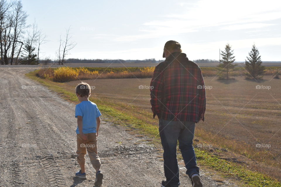 A boy and his grandpa in the country 