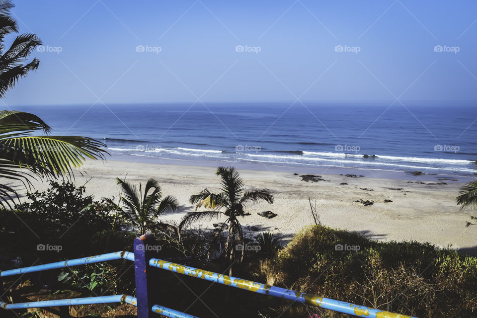 Panorama landscape view of a beautiful tropical sea beach in summertime during christmas holiday. ( MUMBAI, MAHARASTRA, INDIA). Travel vacation and holiday concept.