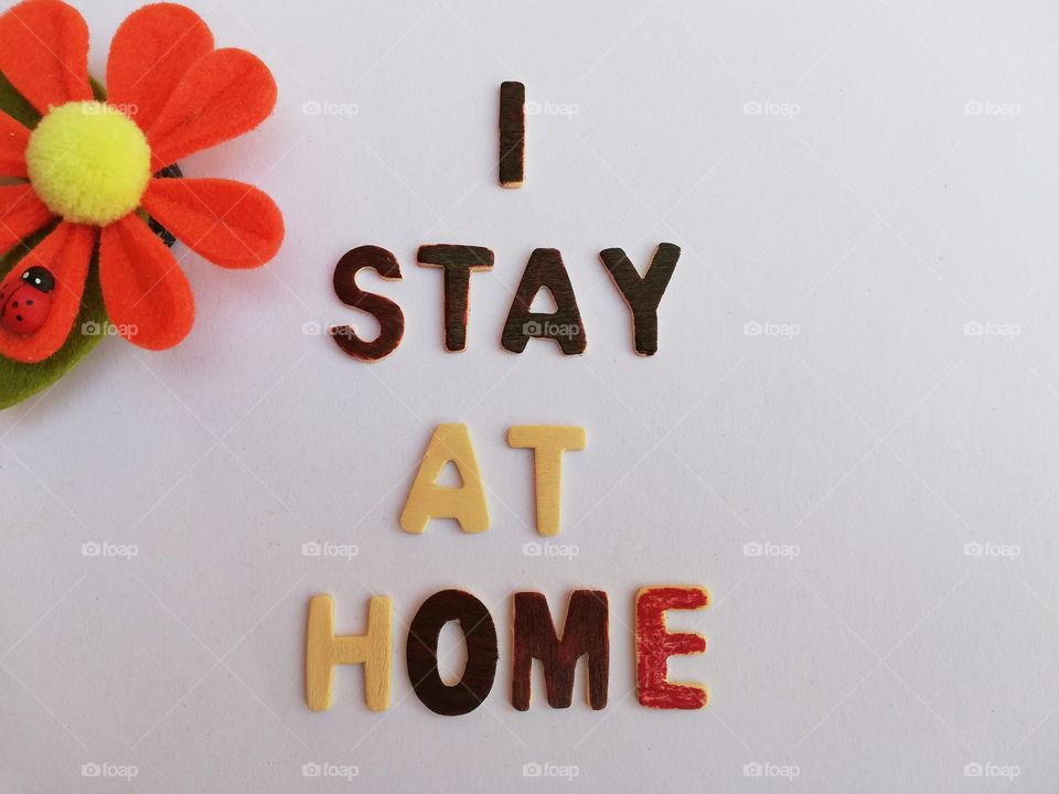 Written :"I stay at home"