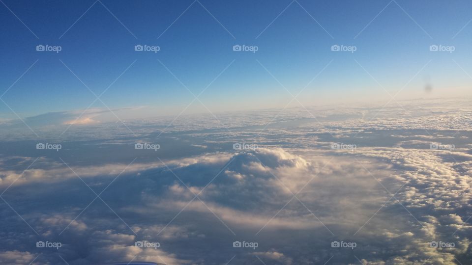 Big Sky Mountain. Clouds looking like mountains from a plane over Chicago