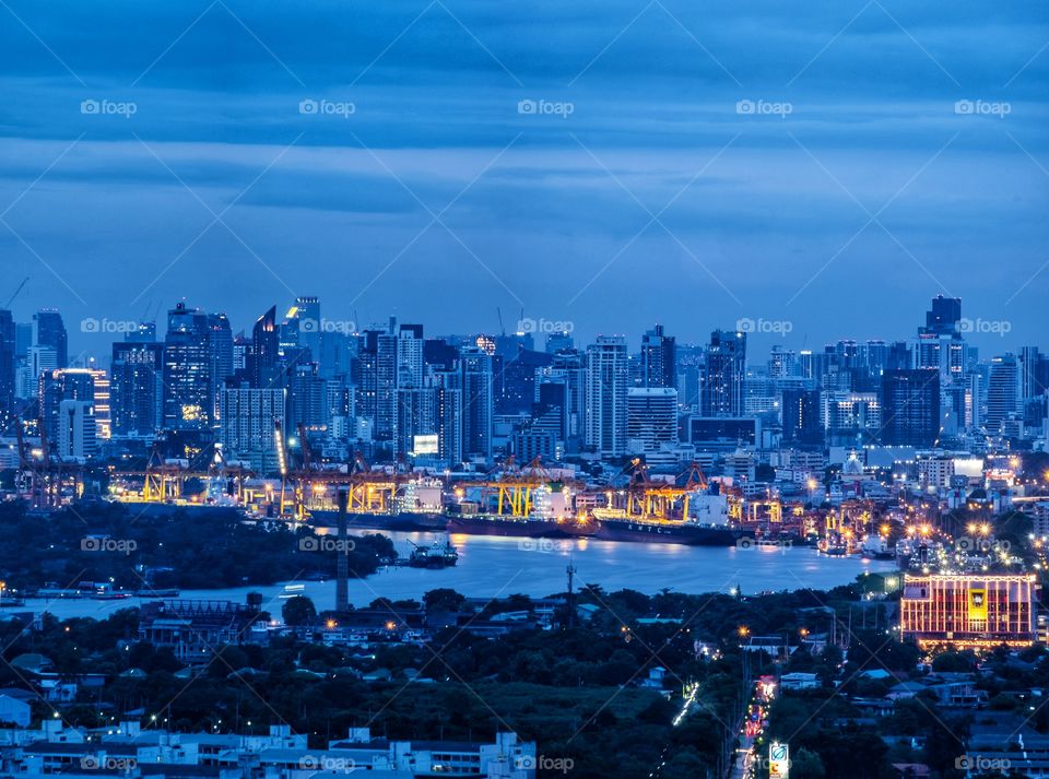 Bangkok city night scape in blue background