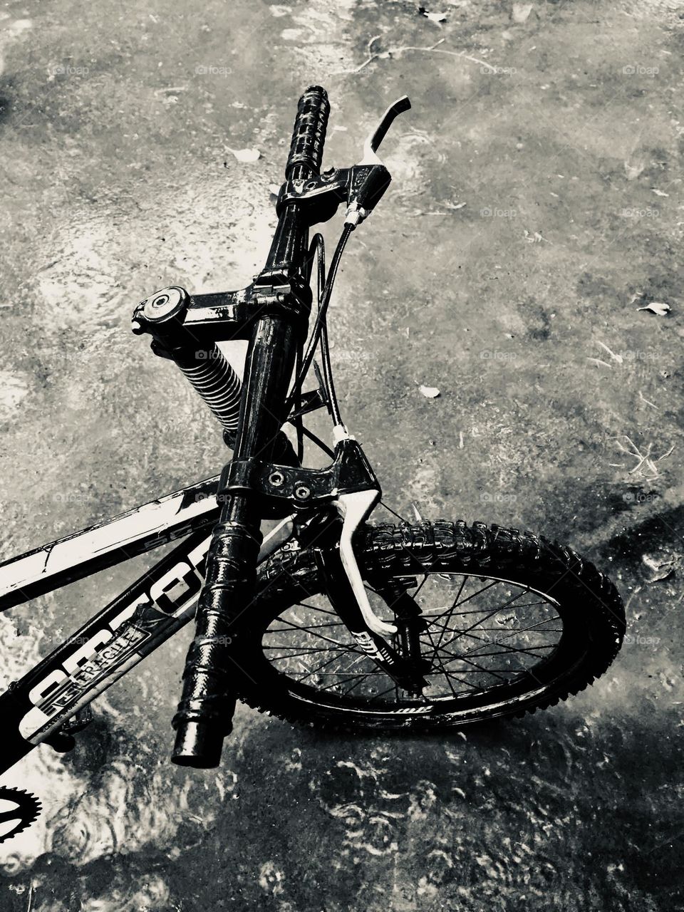 Lonely bicycle under the heavy rains 