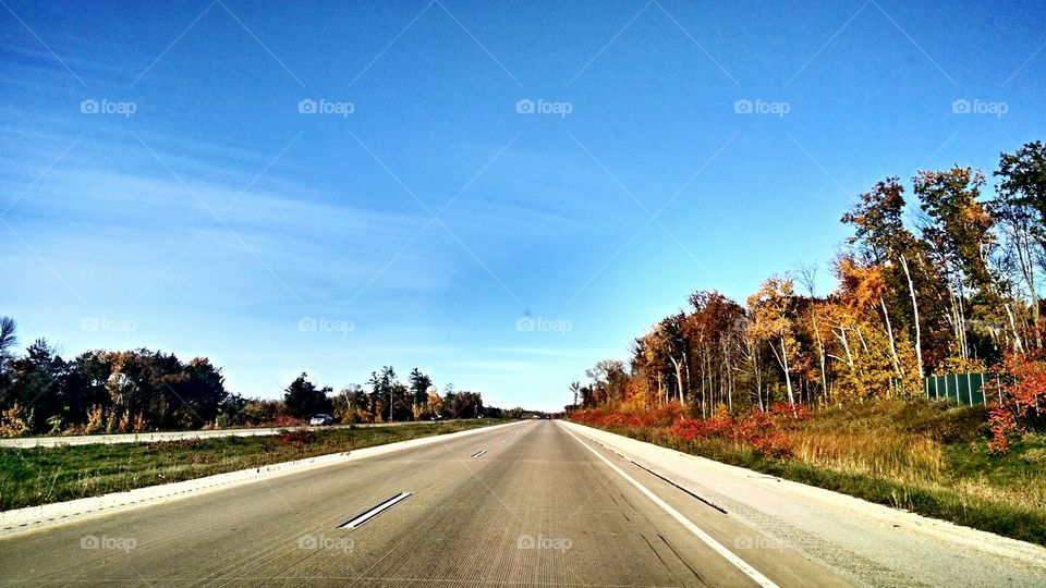 Highway in Autumn. Driving through Door County, WI in autumn.