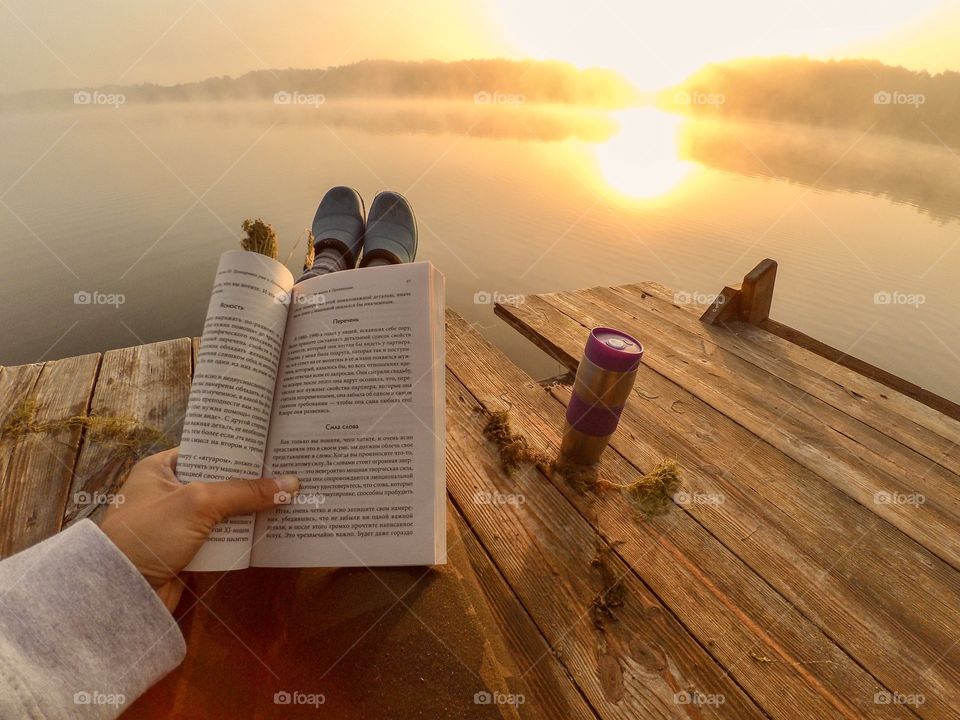 Having coffee with sunrise on the river.  