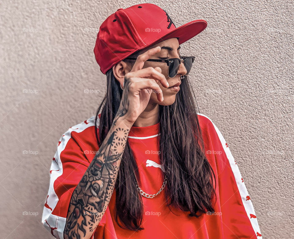 Portrait of a young girl with tattoos 