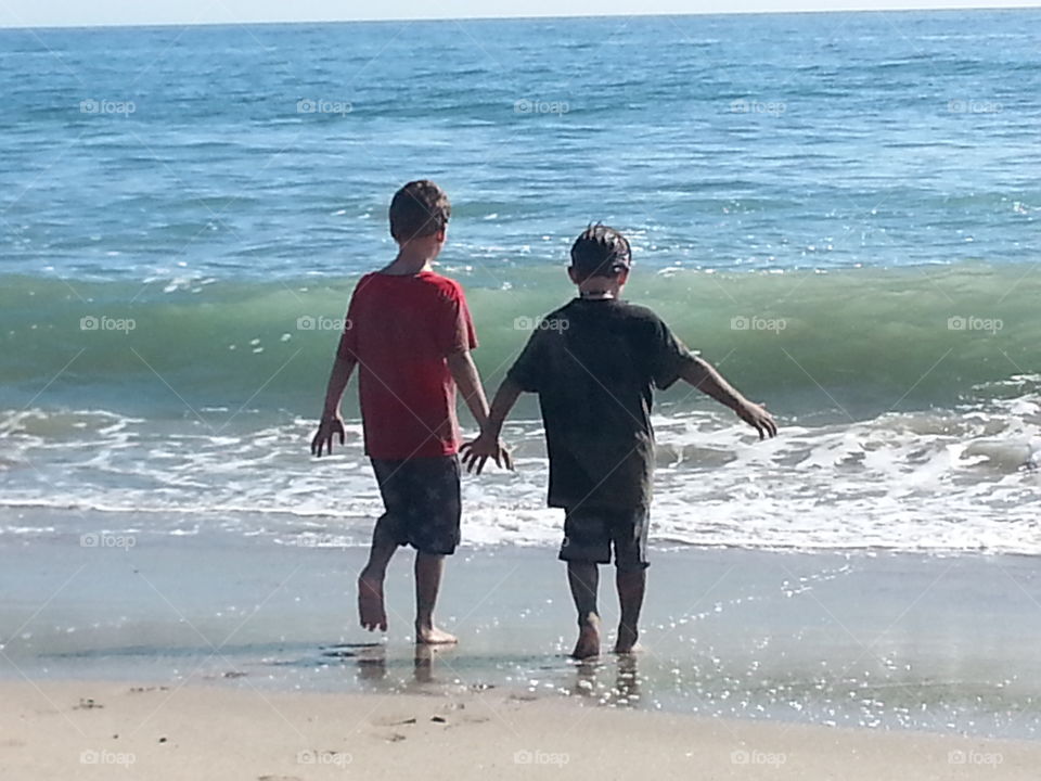 brothers at the beach