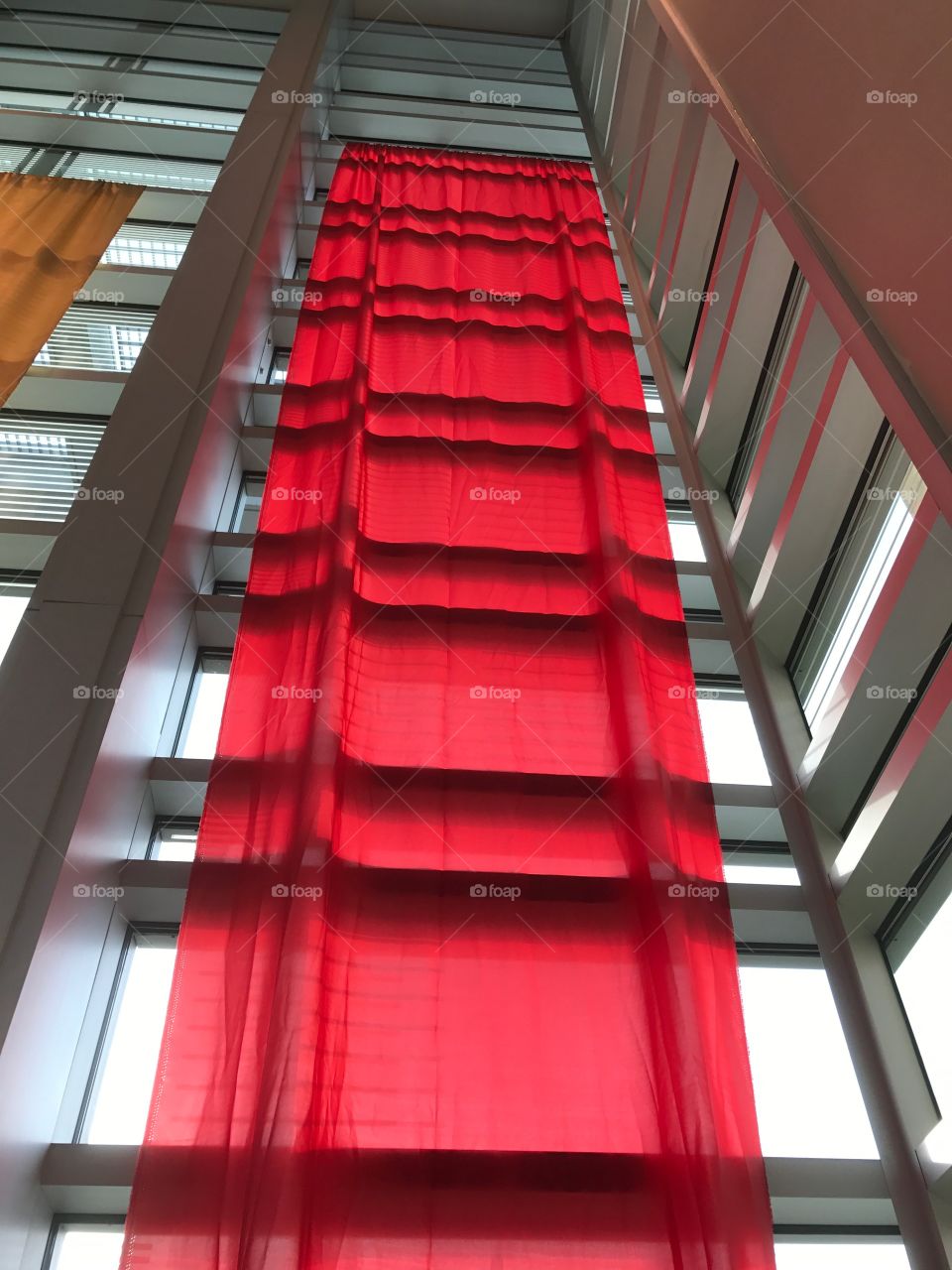 Red draped window 