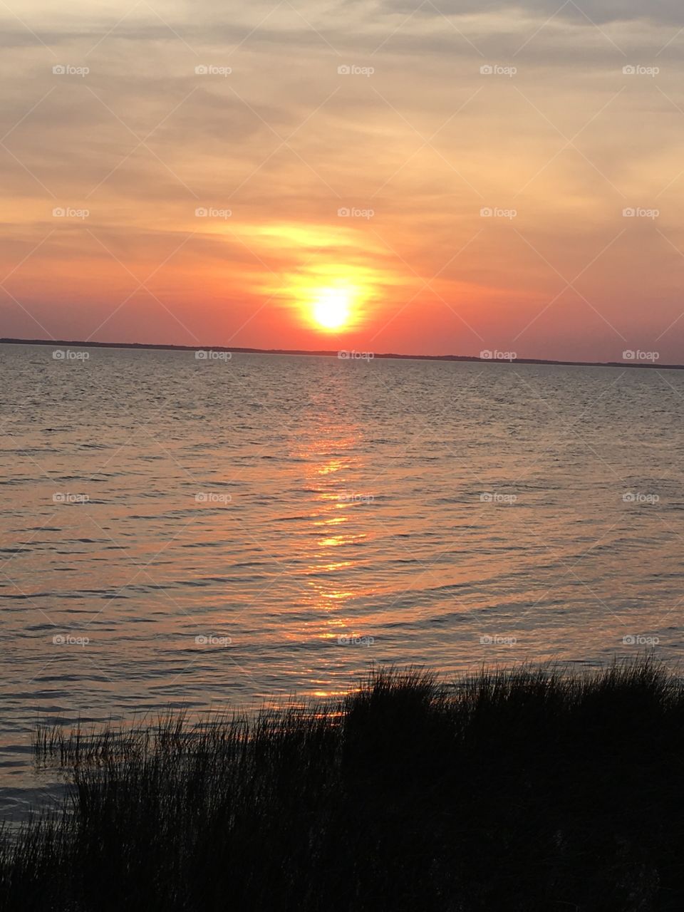 Boardwalk view of sunset Duck, NC