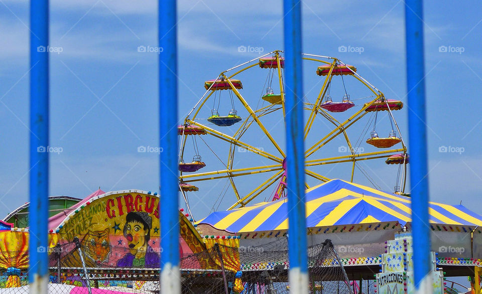 Abandoned sad Circus shot through fence