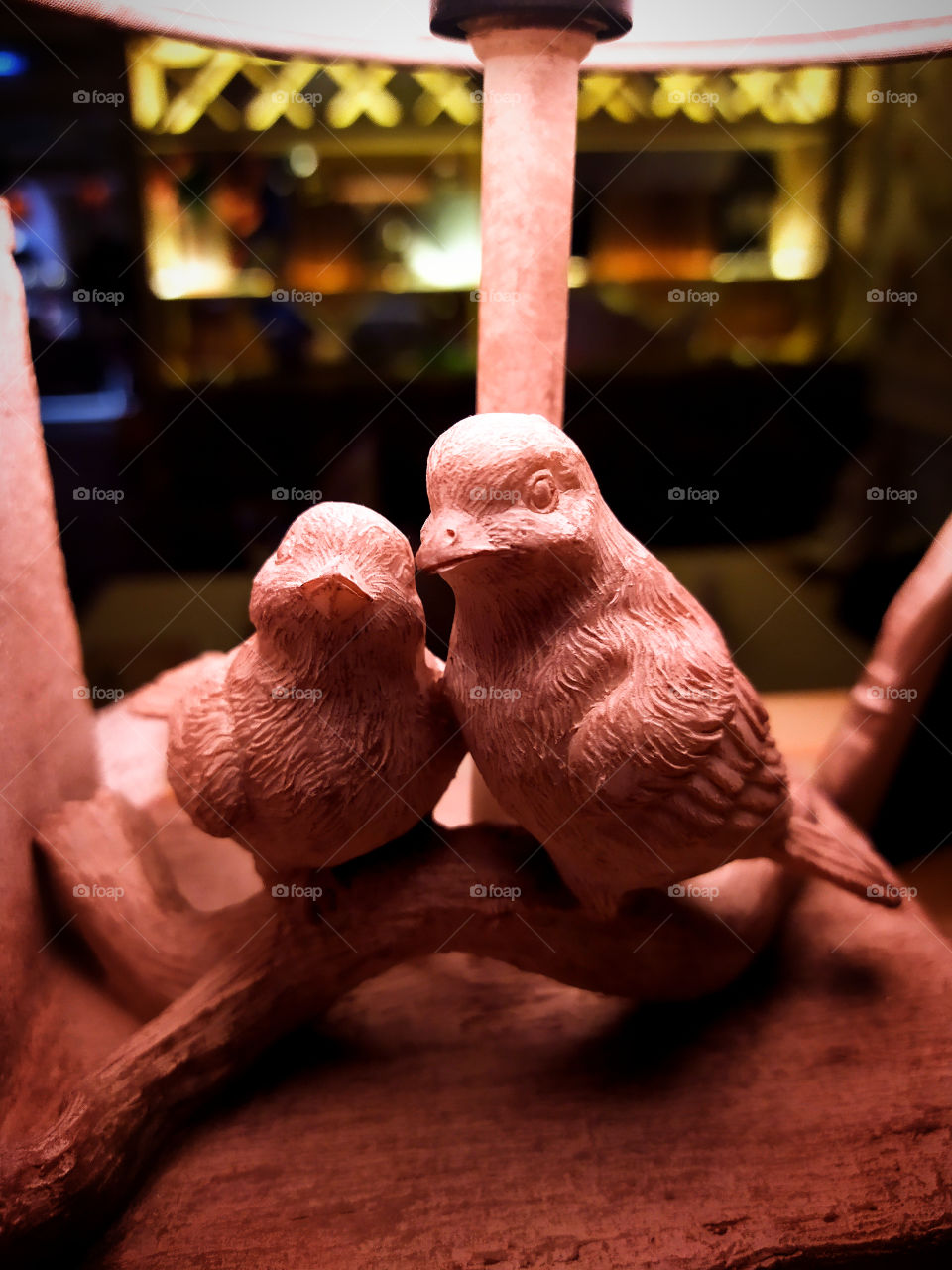 Statuette.  Two enamored wooden birds