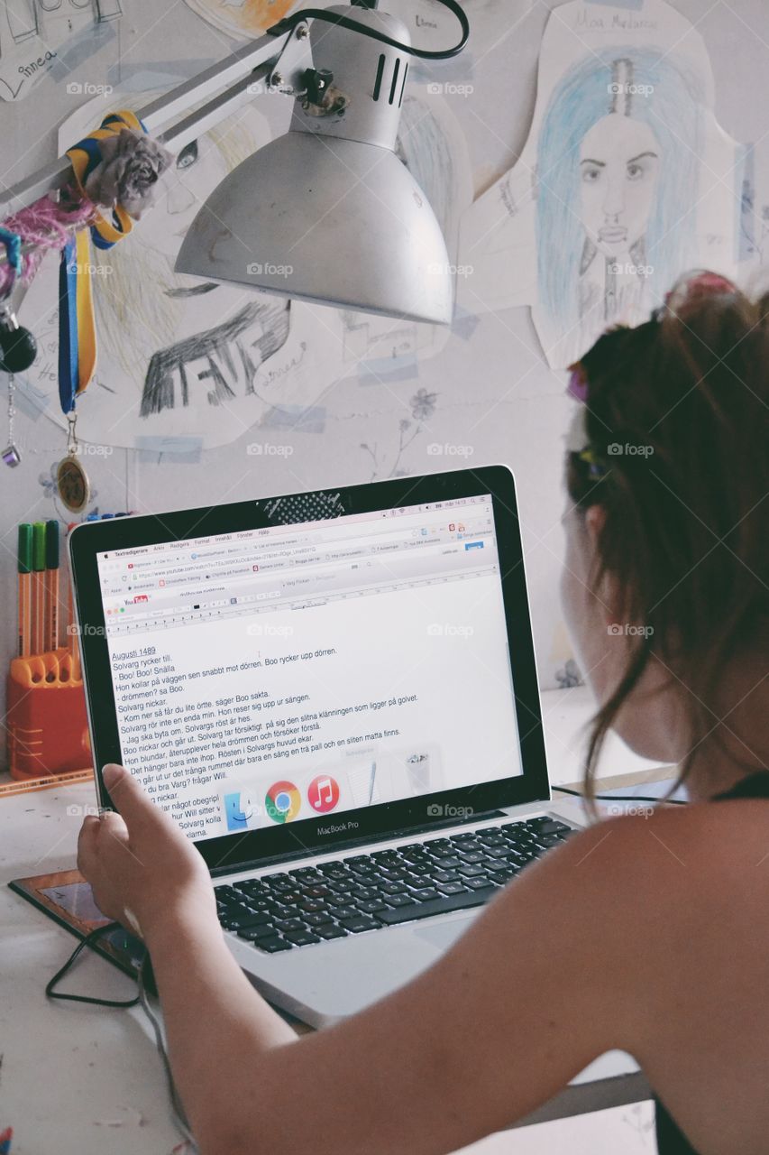 Girl using her laptop