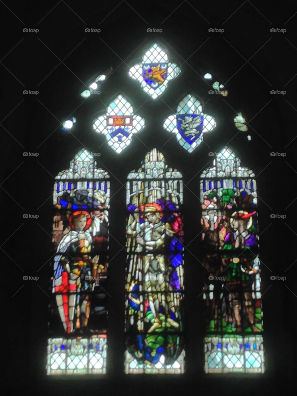 Stained glass beauty. One of the windows from Winchester Cathedral the beautiful colours reflected in light