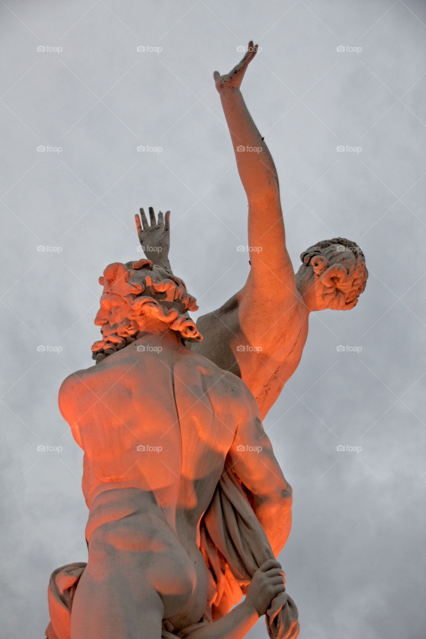 statue of a person in a garden