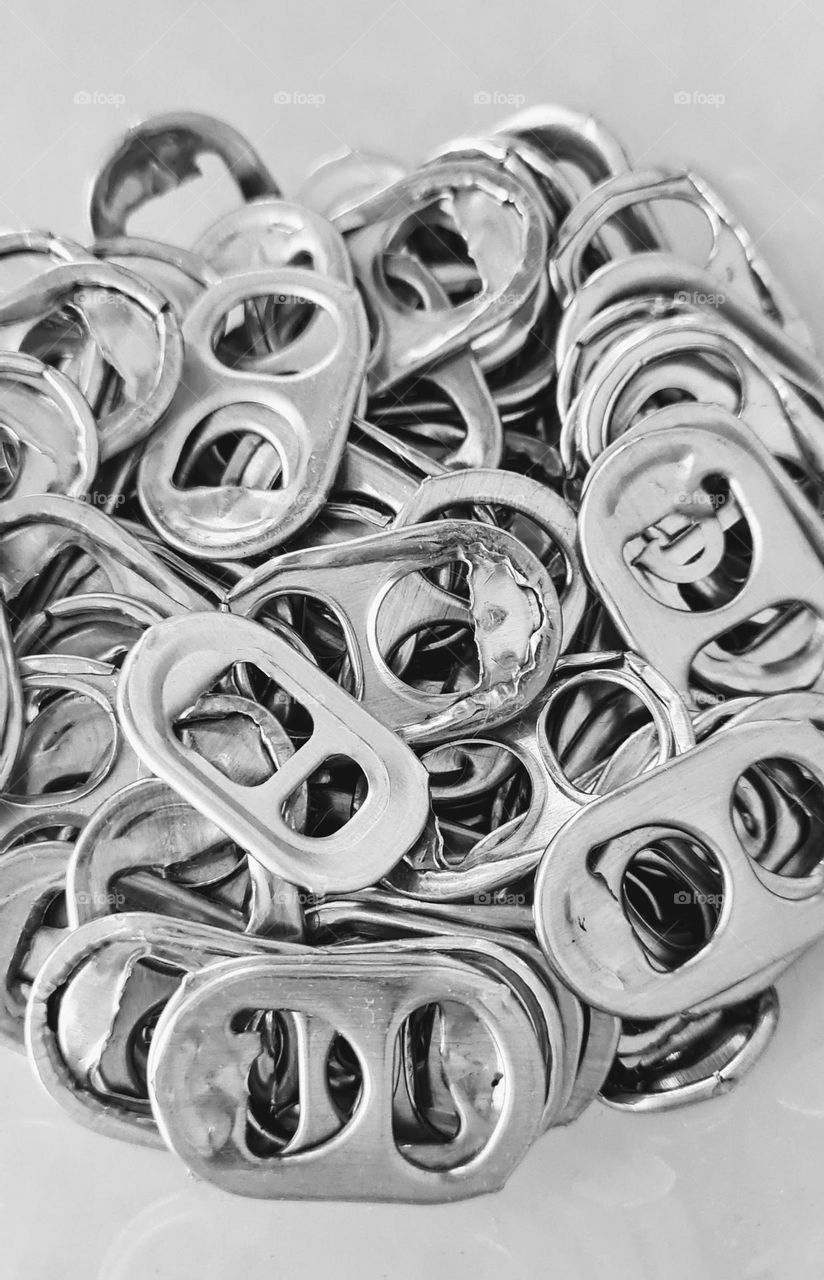 Soda pull tab recycling