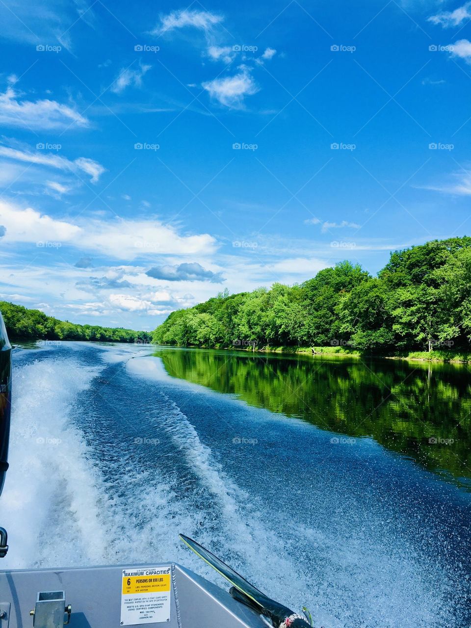 Boating on a river during Summer in Maine.