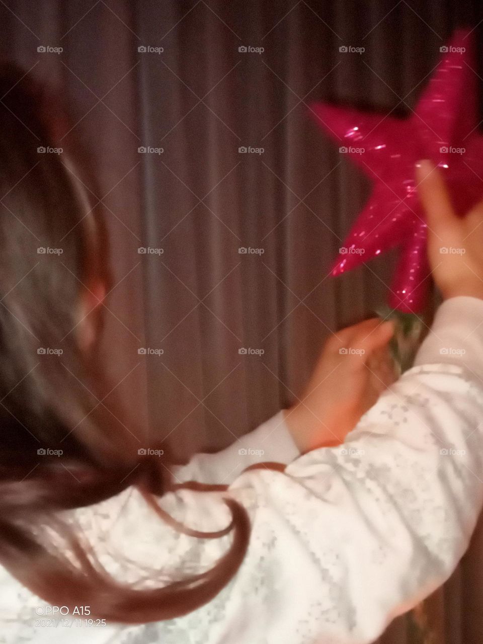 Girl with the star peak Christmas