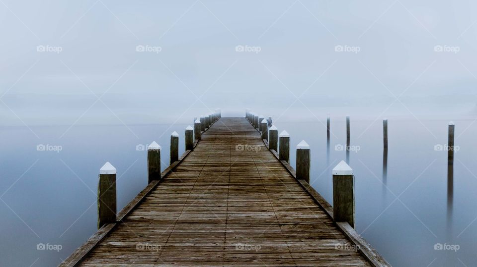 Long exposure of foggy pier. 