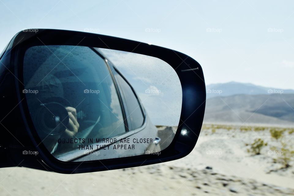 Driving on 190 through Death Valley and btw objects in mirror are closer tham they appear