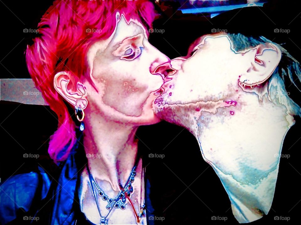 A passionate kiss in front of our former residence in Midtown Manhattan West in New York City. We had a fifth floor “suite” we operated a small audio/video studio out of before the World switched to using handheld devices. 2011. Hypnotic Productions