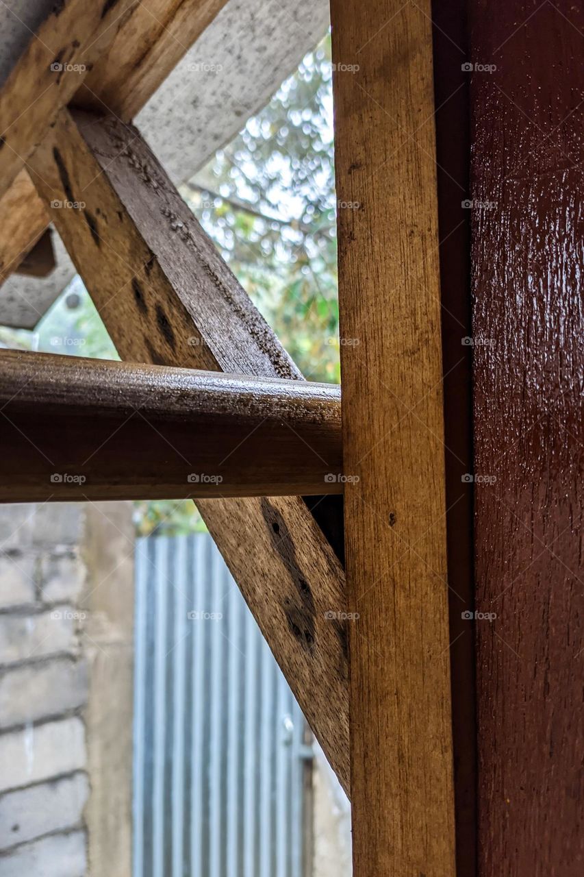 House window with wooden elements in eye level view