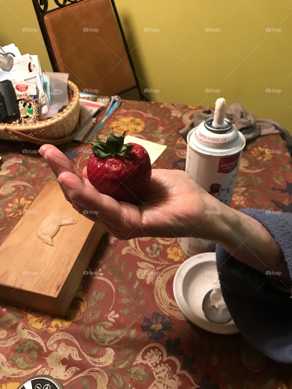 Strawberry in hand 