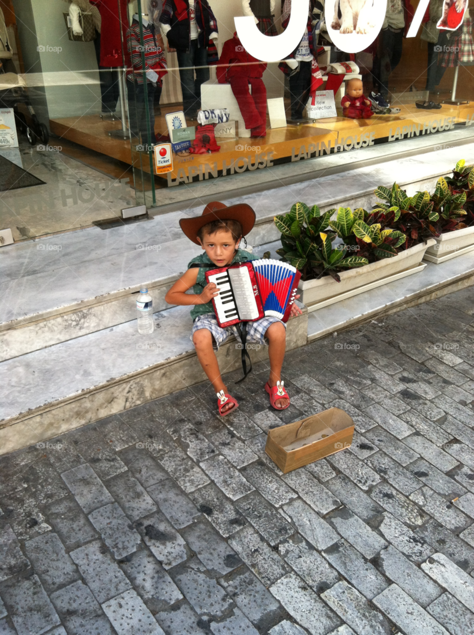 street music boy playing music instrument street by seval0001