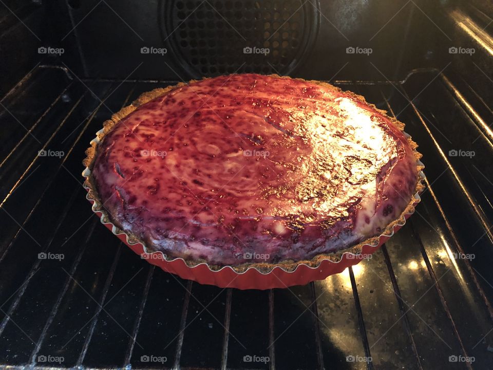 Delicious Raspberry Cheesecake in the oven 