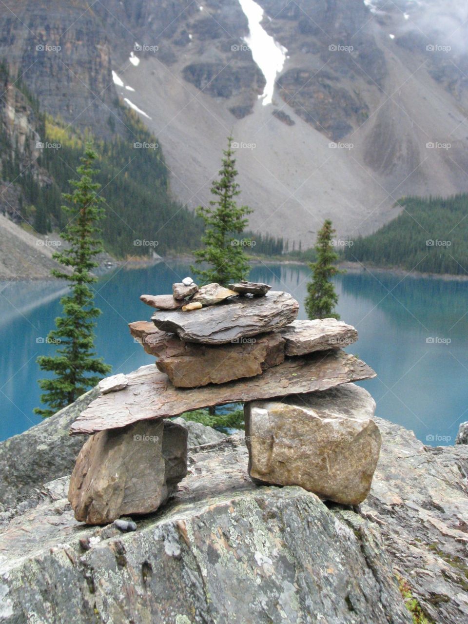 Native rock statue at the lake 