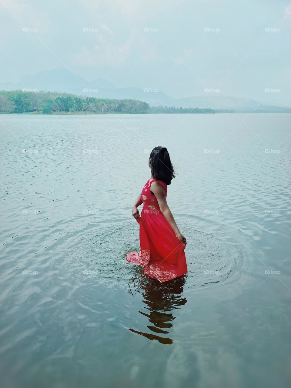 Portrait of a girl in lake 