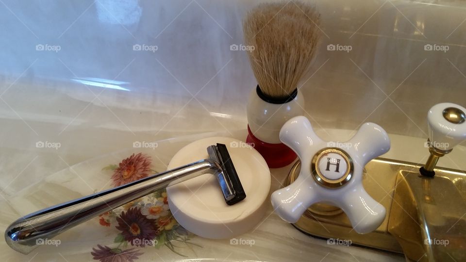Razor,  Shaving brush, Shaving Soap & Hot Water