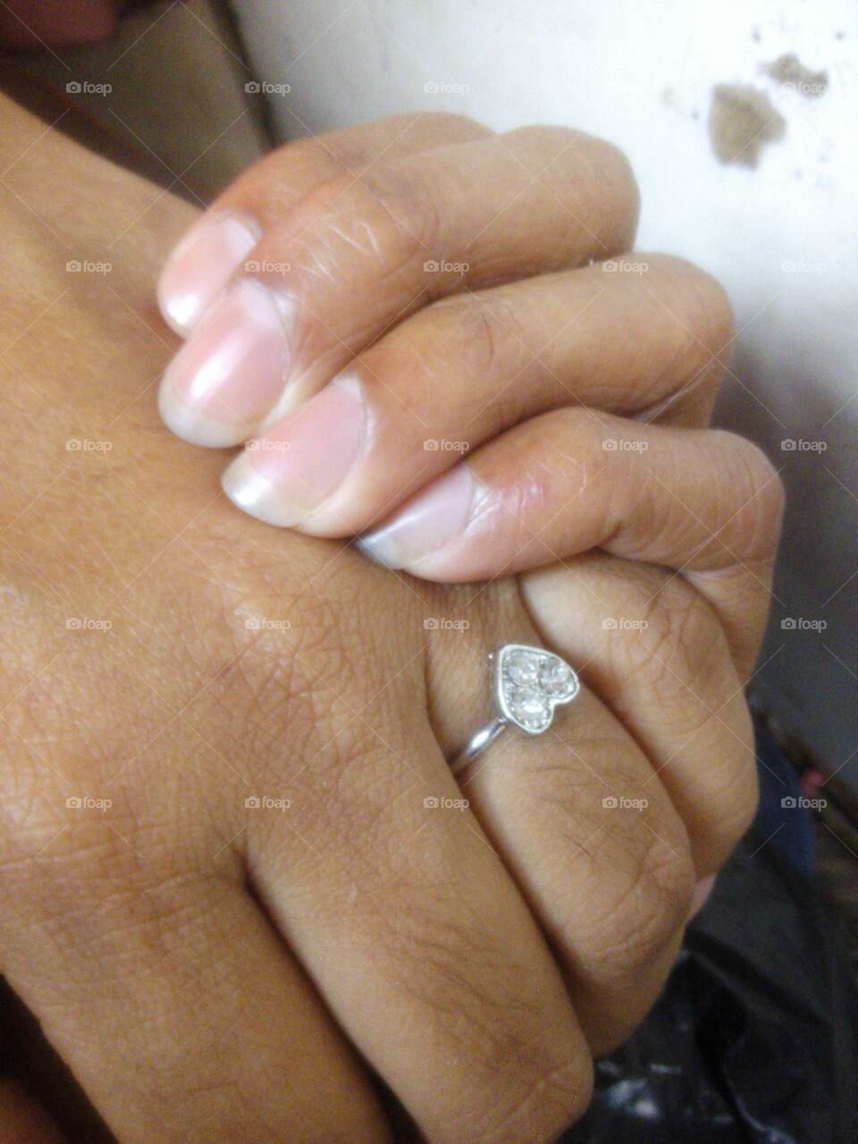 hearted ring with lovely togethered hands